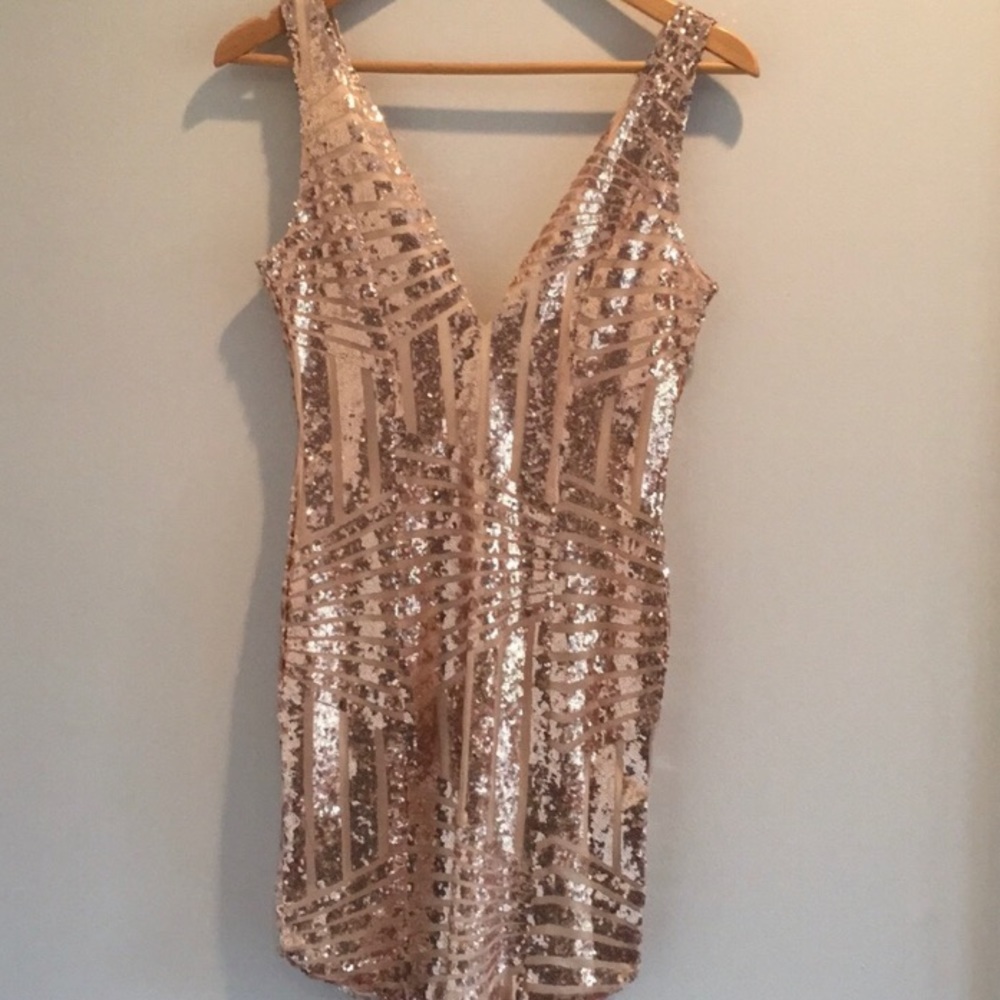 Gold sequin mini dress low cut